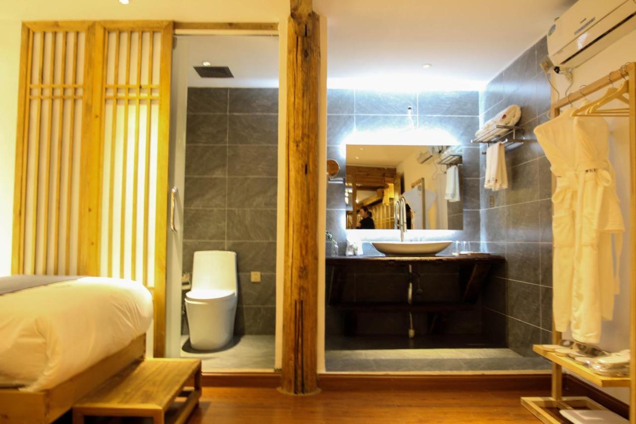 Lijiang Shushi Zhengliu Mujiayuan Hotel Bagian luar foto