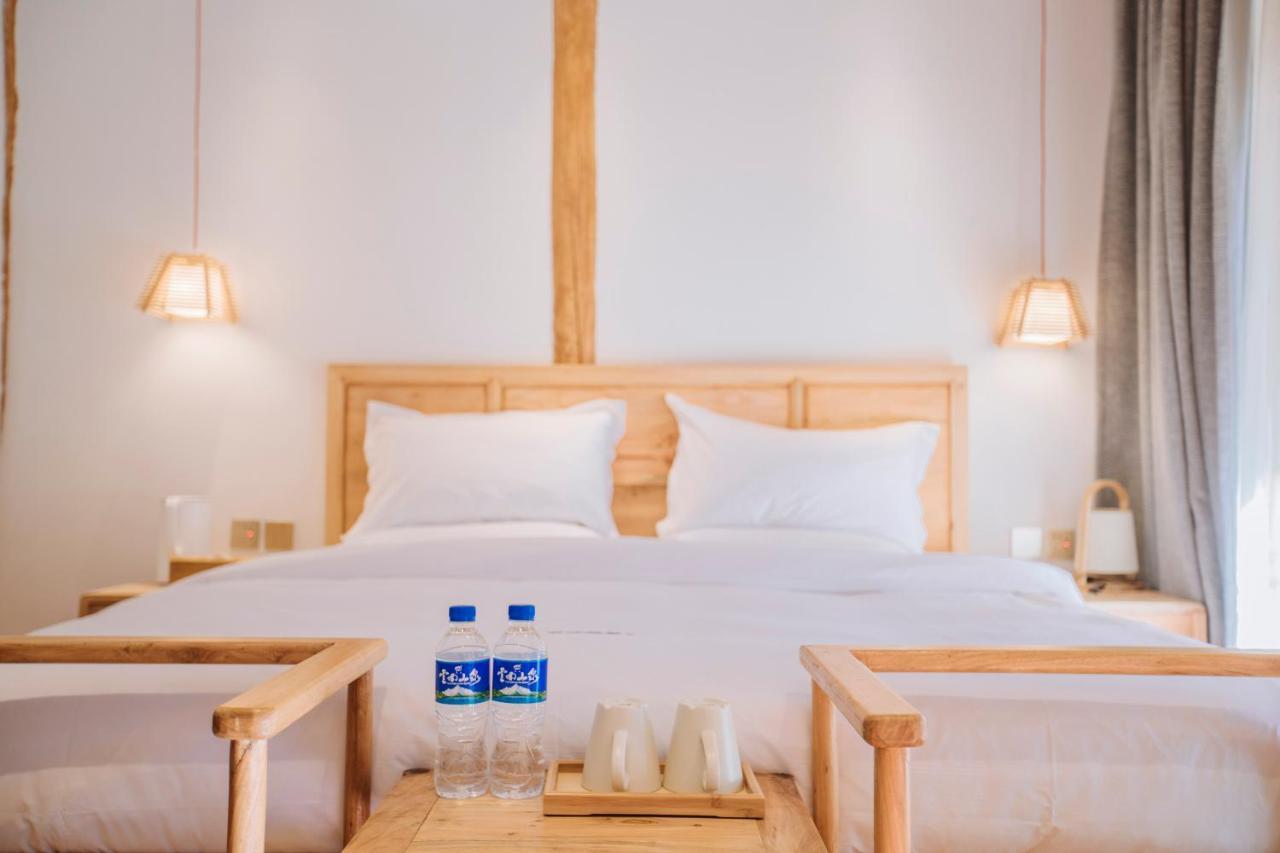 Lijiang Shushi Zhengliu Mujiayuan Hotel Bagian luar foto