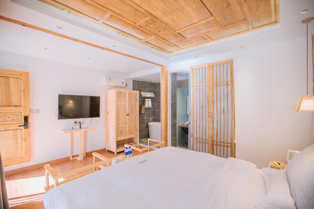 Lijiang Shushi Zhengliu Mujiayuan Hotel Bagian luar foto