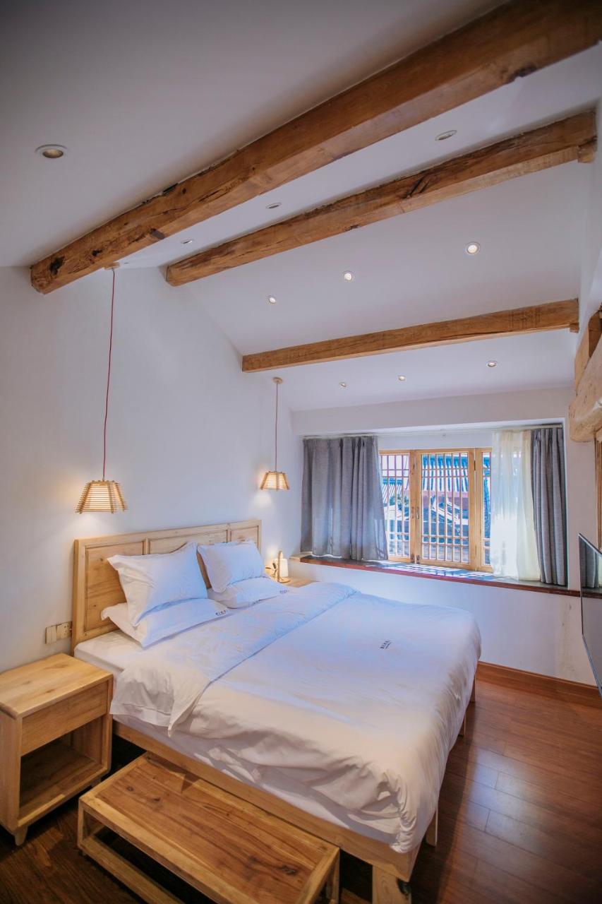 Lijiang Shushi Zhengliu Mujiayuan Hotel Bagian luar foto