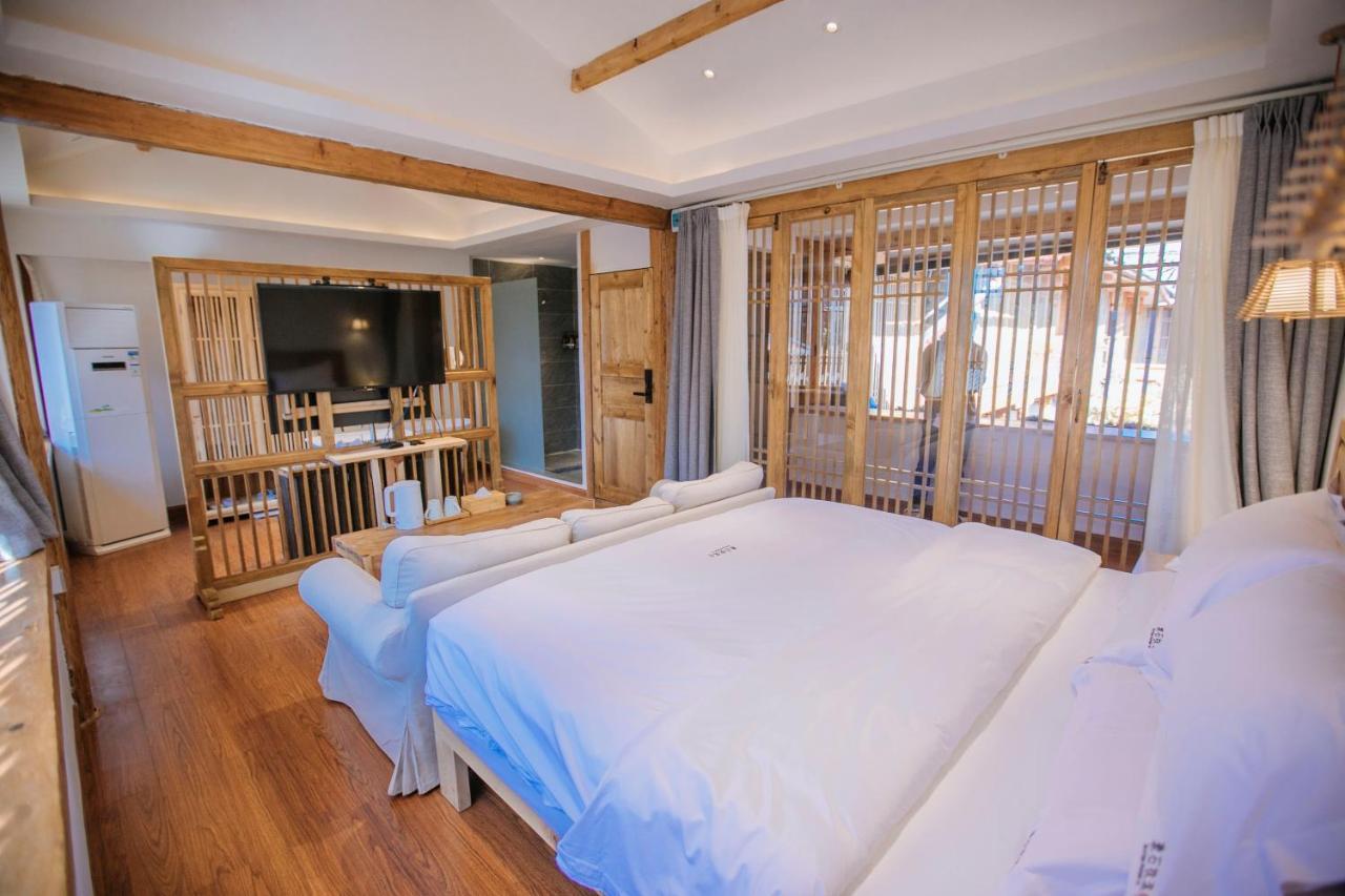 Lijiang Shushi Zhengliu Mujiayuan Hotel Bagian luar foto