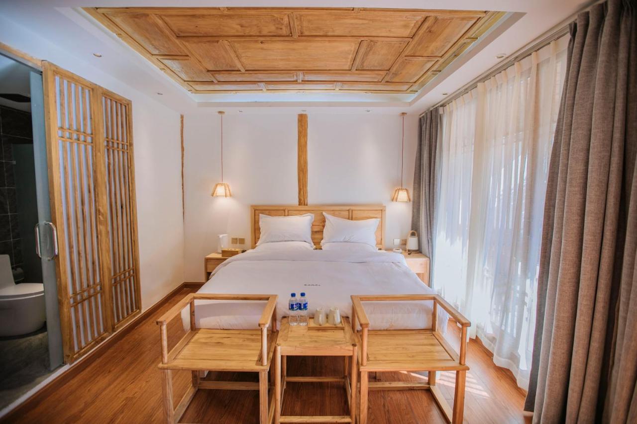 Lijiang Shushi Zhengliu Mujiayuan Hotel Bagian luar foto