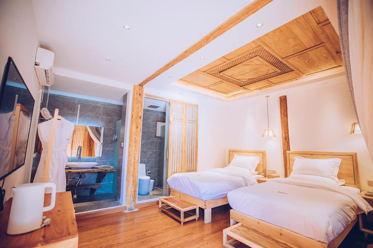 Lijiang Shushi Zhengliu Mujiayuan Hotel Bagian luar foto