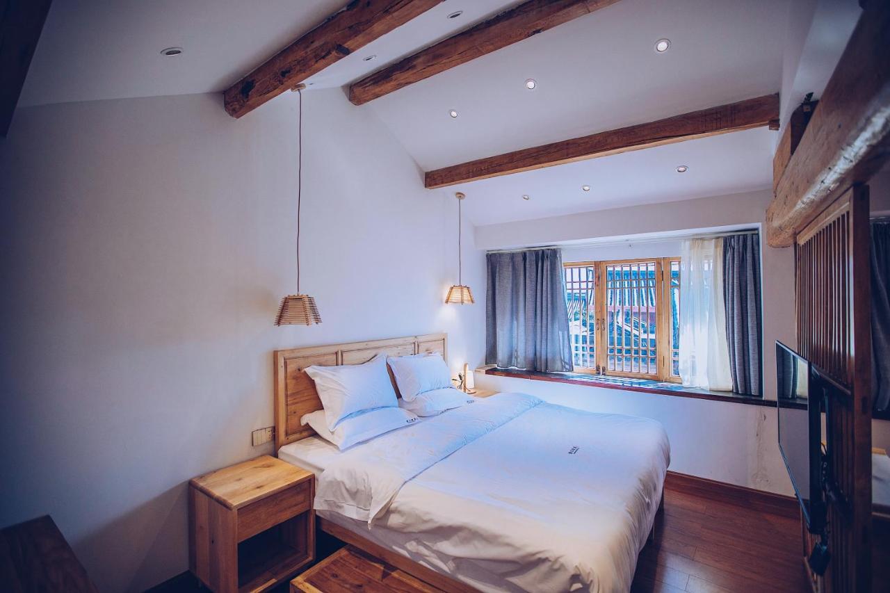 Lijiang Shushi Zhengliu Mujiayuan Hotel Bagian luar foto
