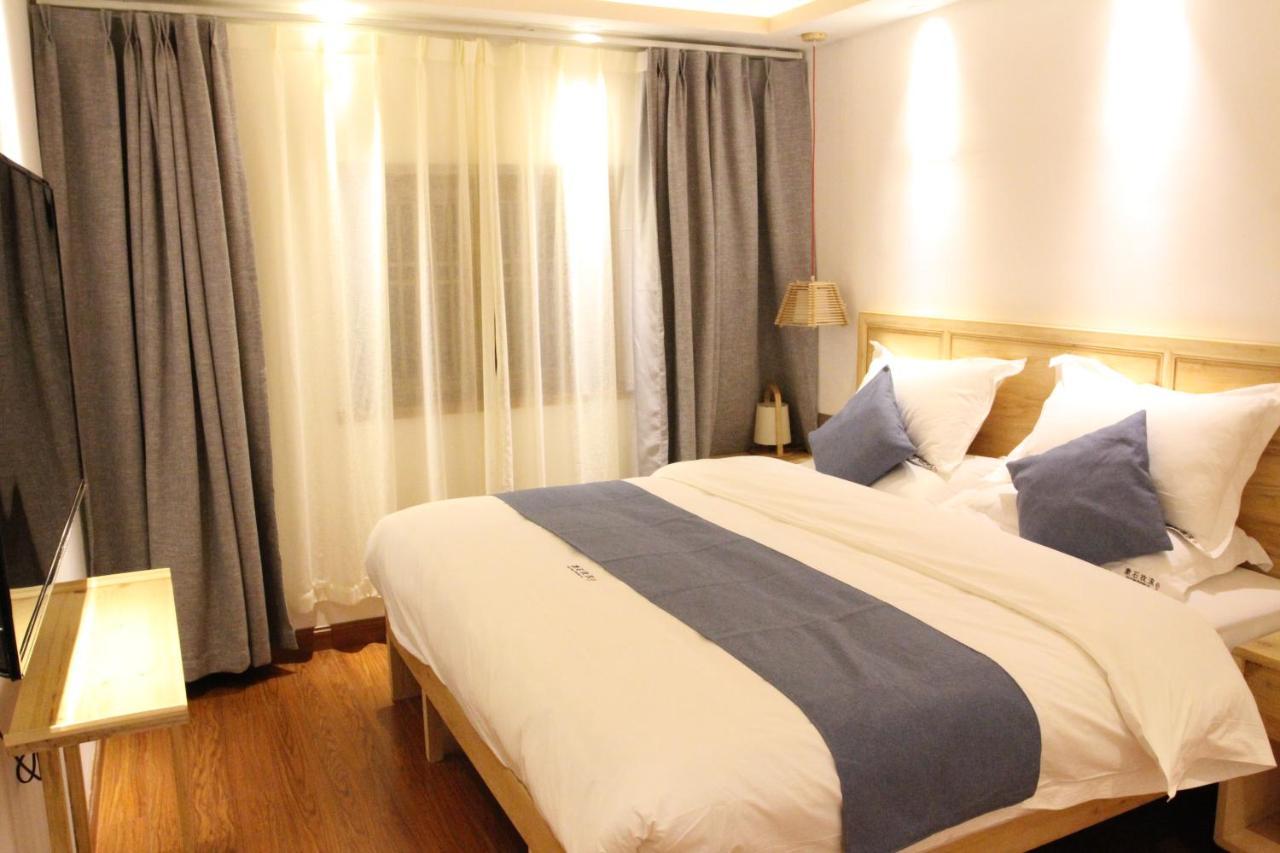 Lijiang Shushi Zhengliu Mujiayuan Hotel Bagian luar foto