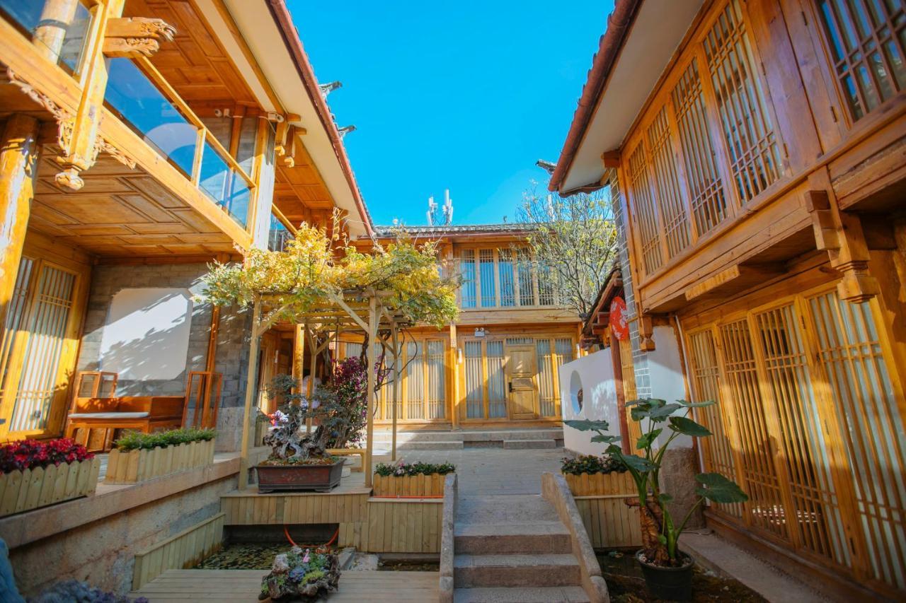 Lijiang Shushi Zhengliu Mujiayuan Hotel Bagian luar foto